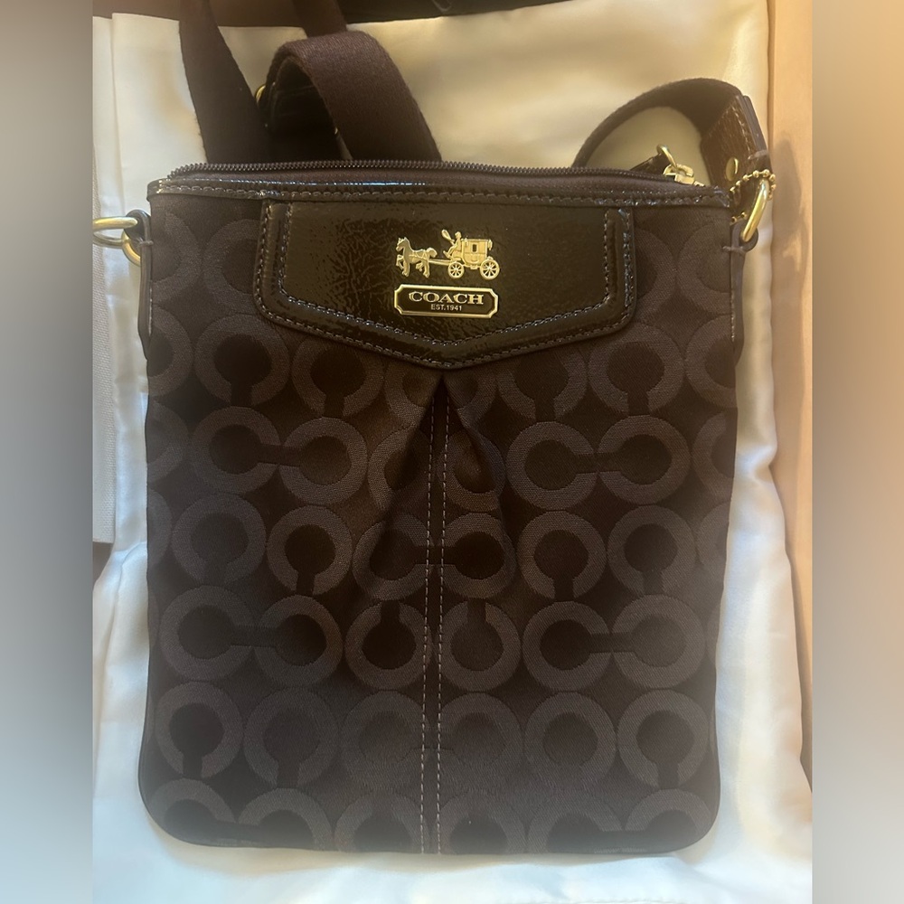 COACH Slim Swingpack Crossbody Brown Embroidered
Signature C Purse